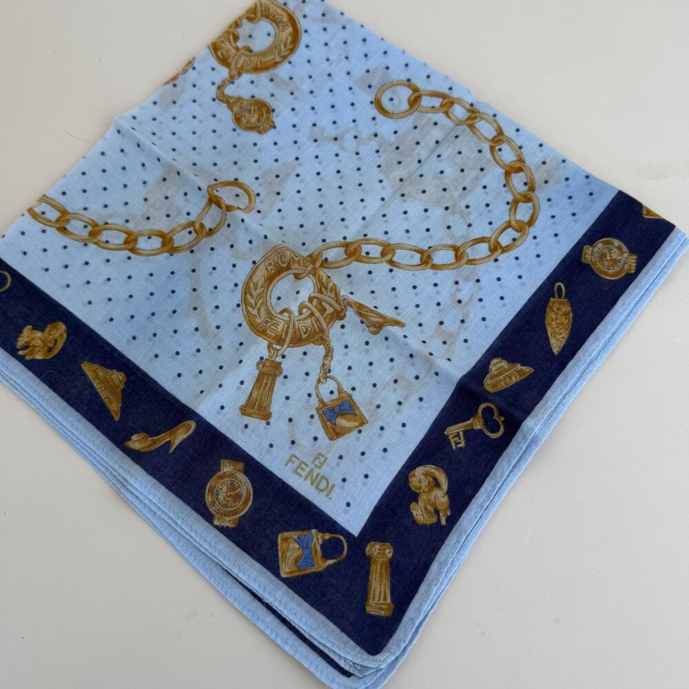 Fendi Roma handkerchief scarf featuring a beautiful gold chain and luxury jewelr